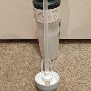 Squeeze water bottle.